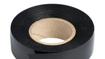Roll of black plastic duct tape, made with oppanol Roll of black plastic duct tape, made with oppanol