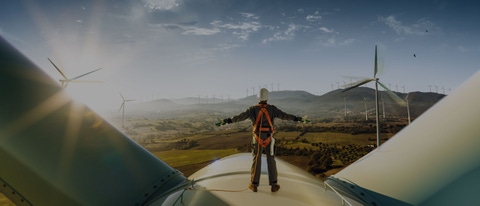 A person and a sustainable wind turbine with lubricant components